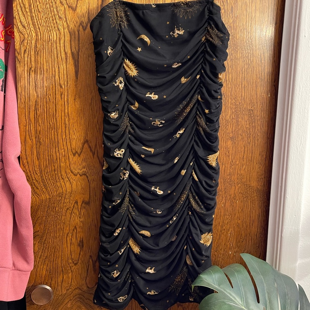 Black and gold astrology print mini dress